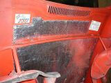 Space-Age insulating mat glued under the bonnet.